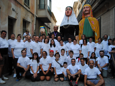 CENTENARS DE PERSONES ACOMPANYEN EL GEGANTÓ DE MOSSÈN ALCOVER EN LA SEVA PARTIDA DE MANACOR  A LLUC
